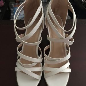 White heeled sandals